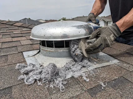 Cleaning Dryer Vent On Roof in Orange